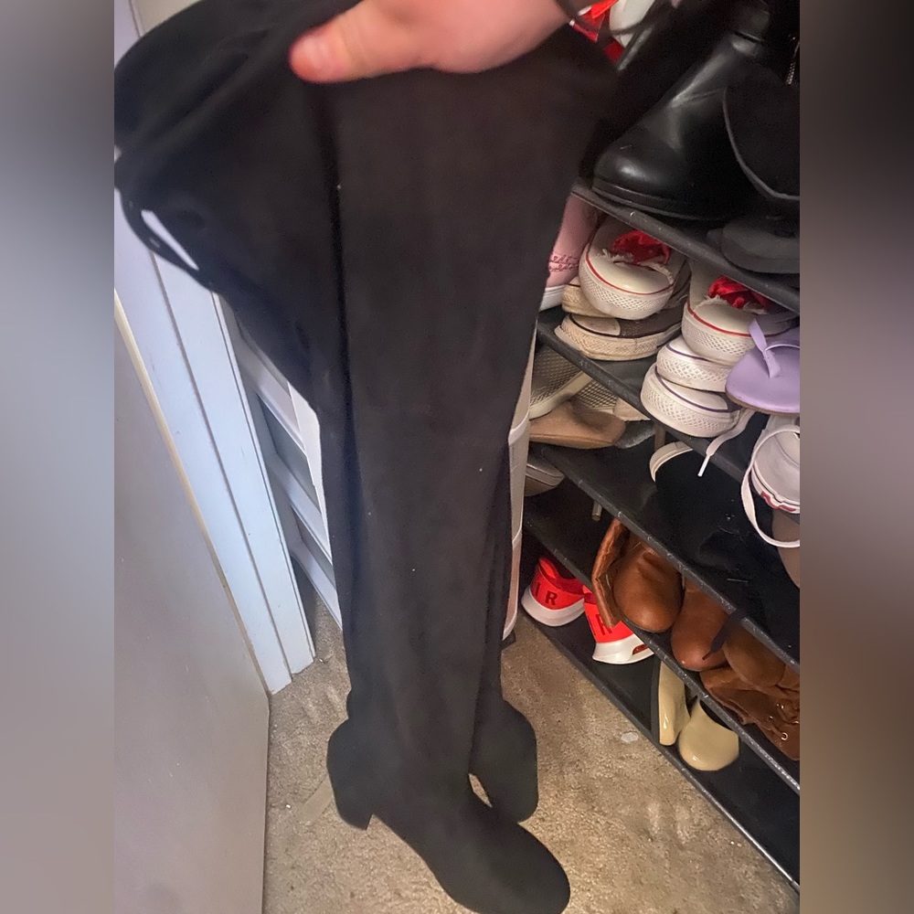 Thigh high black boots